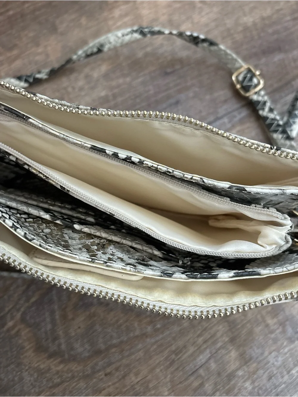 Python-Print Crossbody Wristlet in Black and Cream